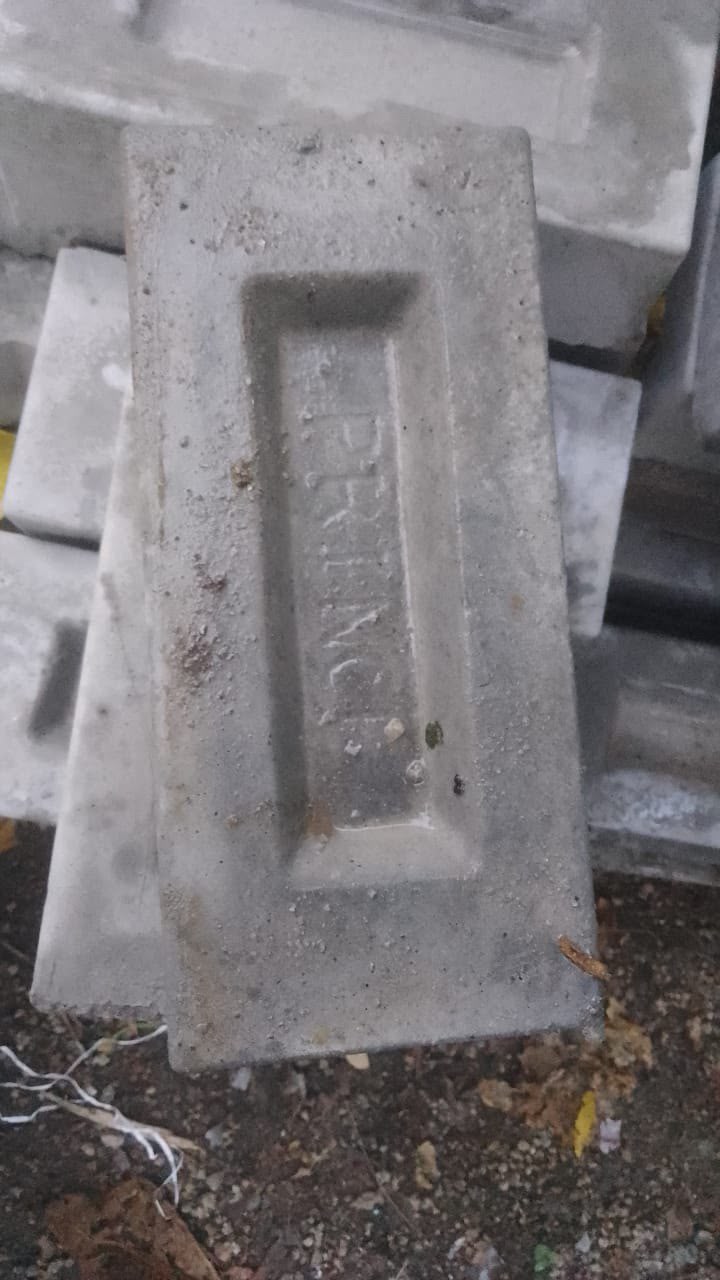 Precast concrete kerb stone with recessed panel finish
